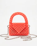 Bolso en perla ábaco rosa