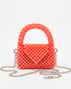 Bolso en perla ábaco rosa