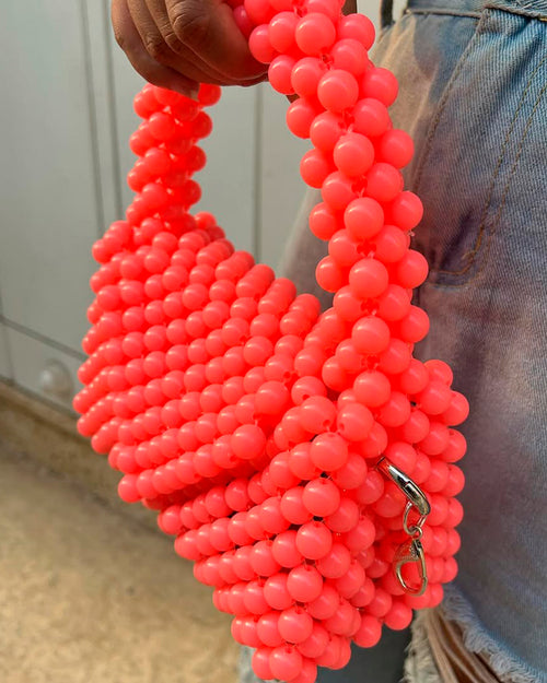 Bolso en perla ábaco rosa