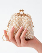 Monedero en perlas beige